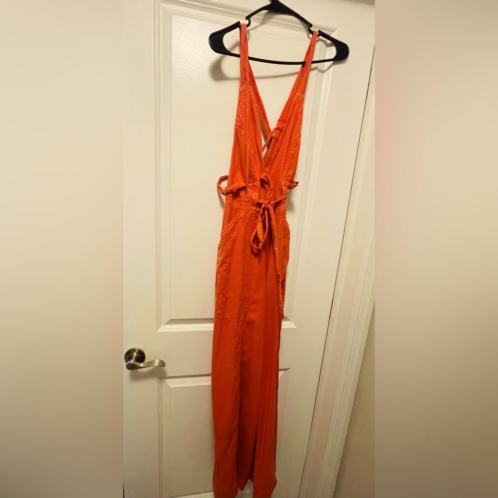 Free people red jumper.